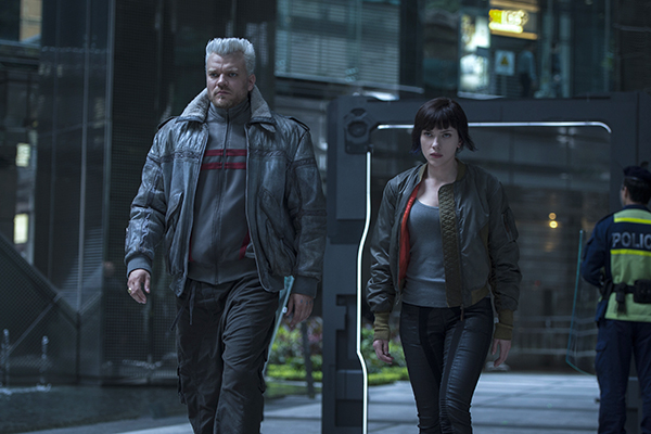Scarlett Johansson plays The Major and Pilou Asbaek plays Batou in Ghost in the Shell from Paramount Pictures and DreamWorks Pictures in theaters March 31, 2017.